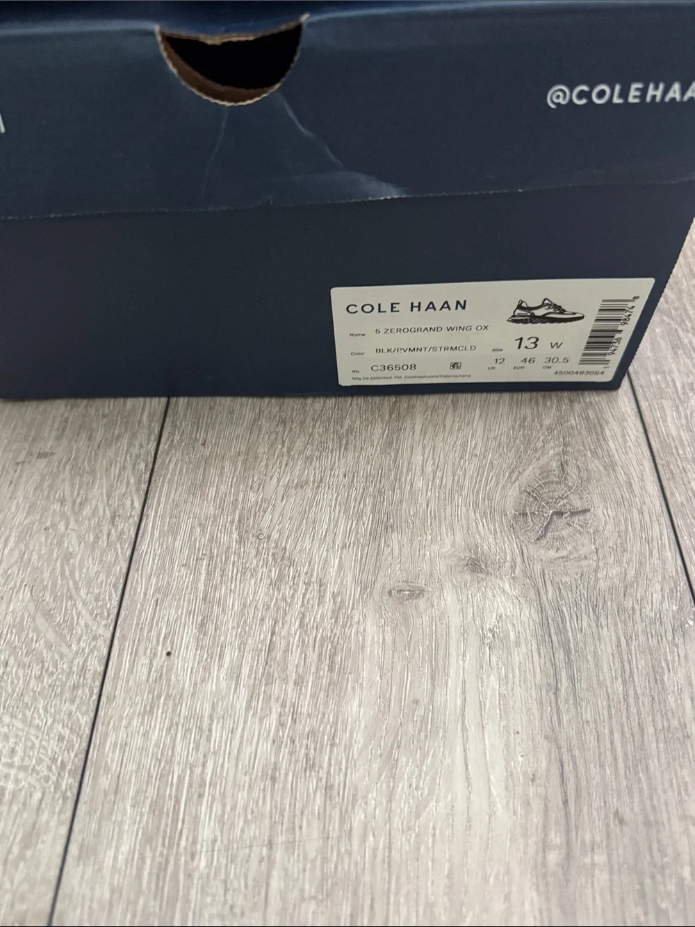 Cole Haan Black Leather Wingtip Derbys with Tan Outsole